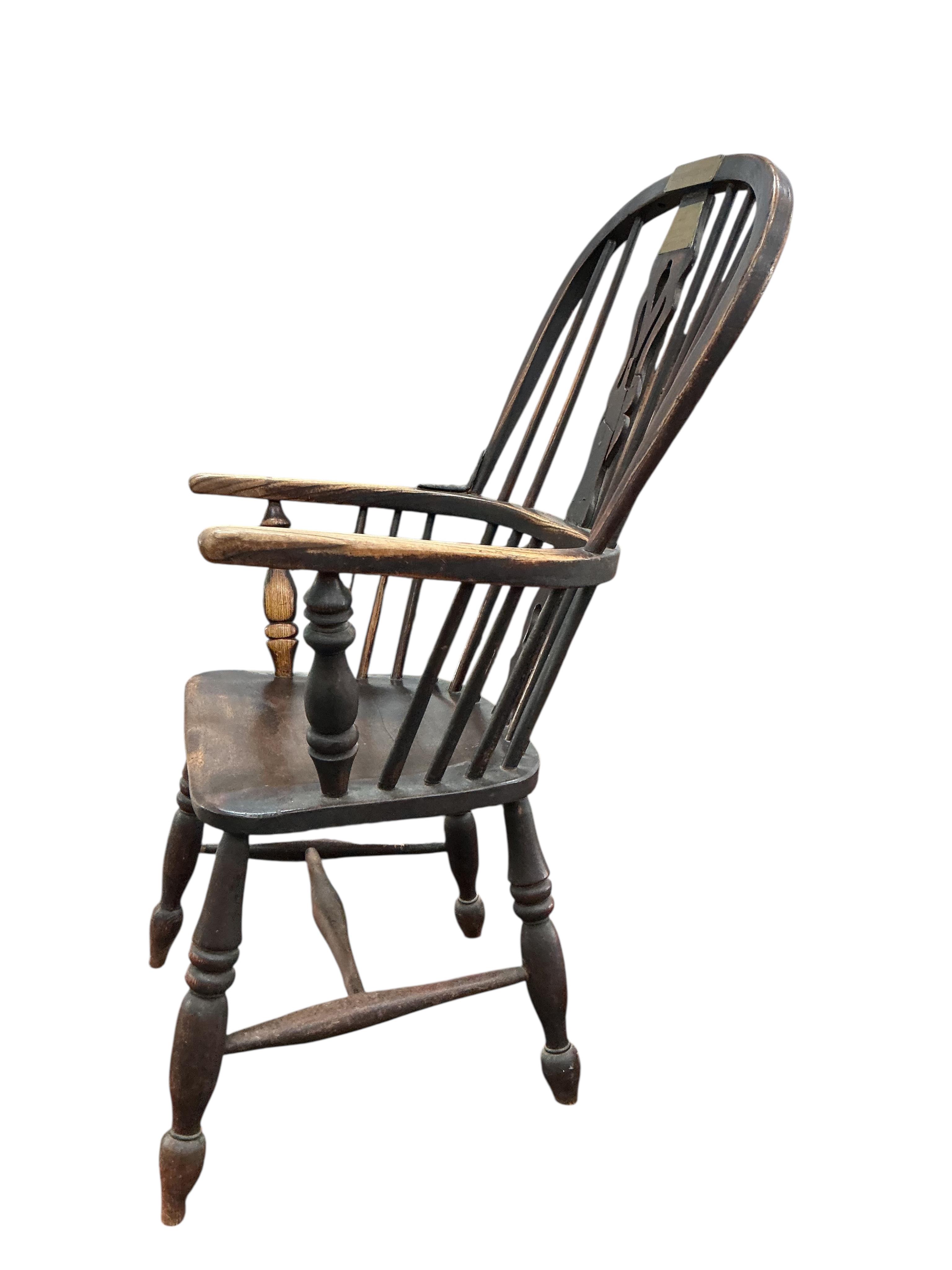 A Victorian ash and elm Windsor armchair, with brass commemorative plaques 'Old George's Chair', width 56cm, depth 46cm, height 102cm